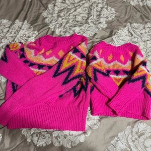Matching Mommy and Me knit sweaters. Adult women size XS and child size XS.